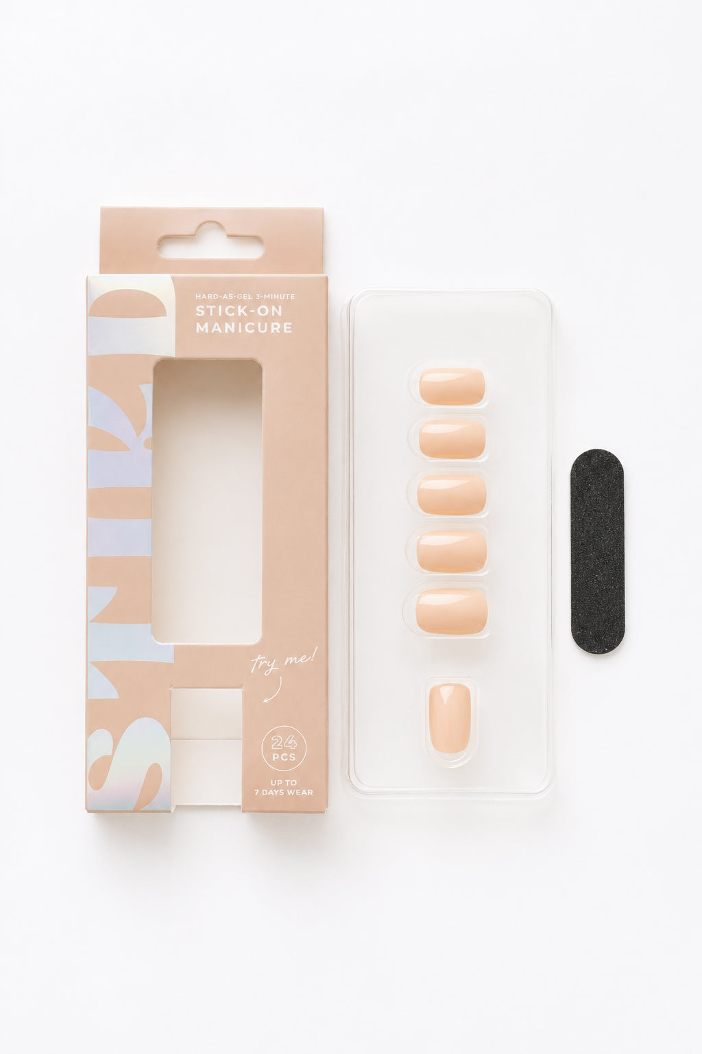 Apricot peach nude press-on nails by STIKD, box opened with nail tray and mini file