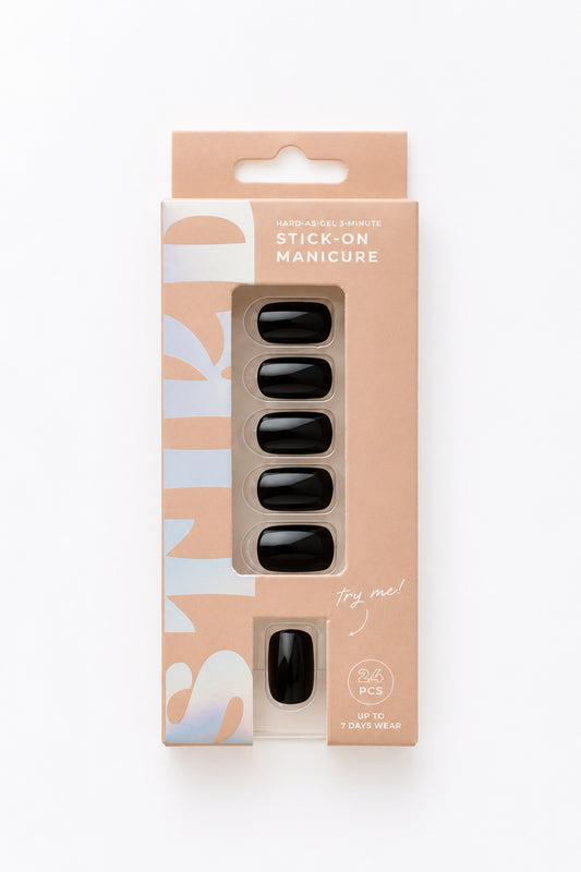 Black Tulip black short press-on nails by STIKD in retail box