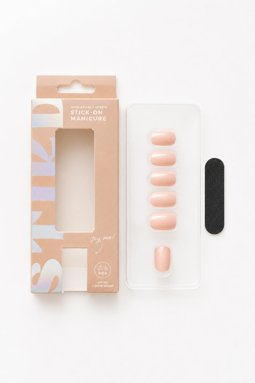 Peony pale pink press-on nails by STIKD, box opened with nail tray and mini file